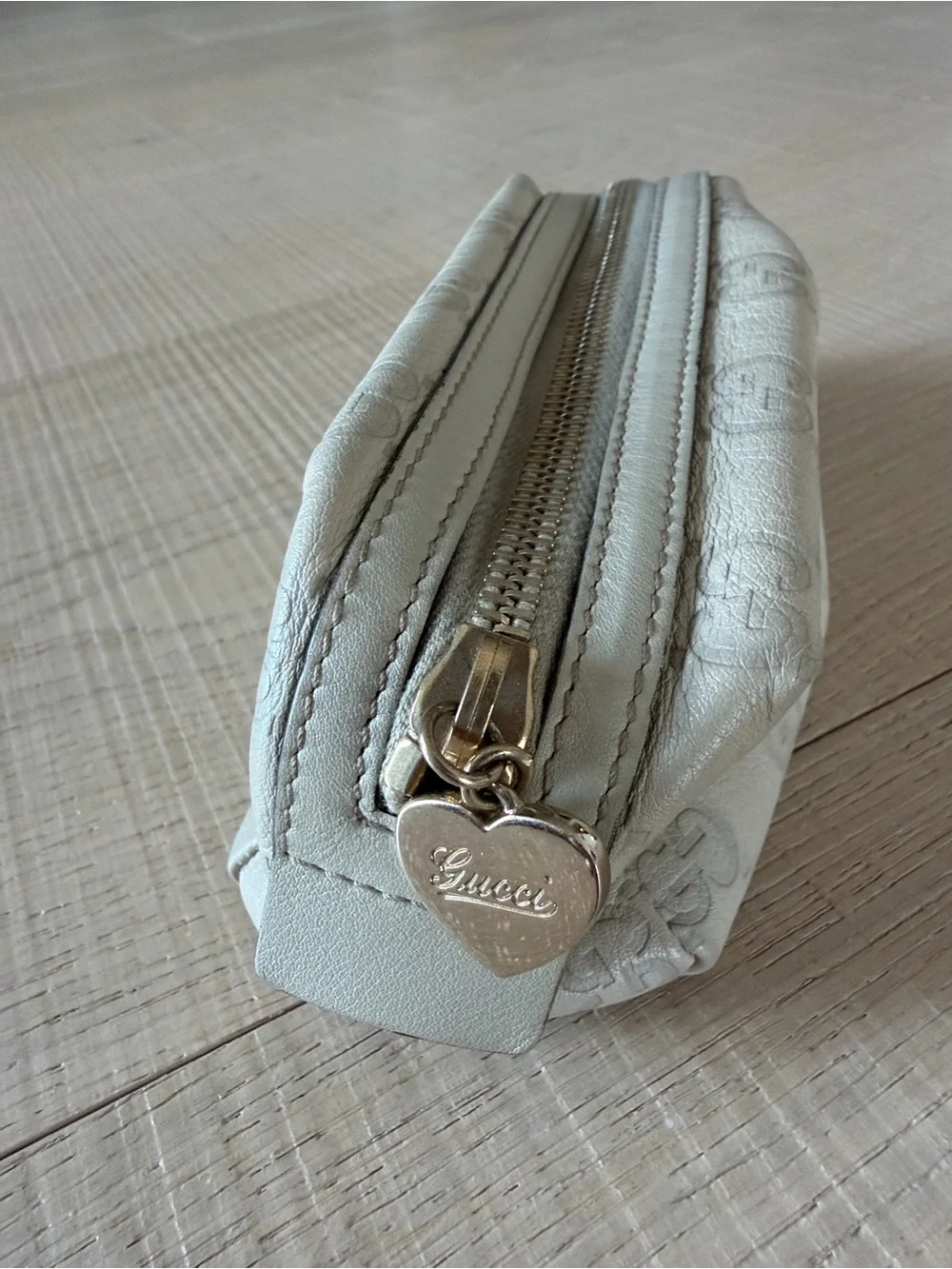 Gucci Guccissima Ivory Leather Zip Cosmetic Pouch with Heart Charm